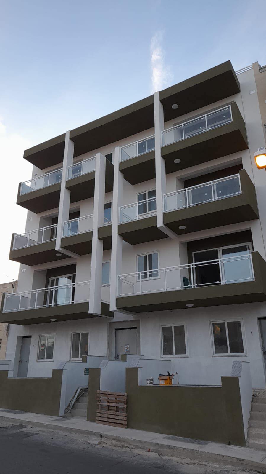 Residential block with aluminium railings and apertures