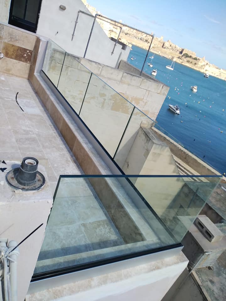 Glass balustrade overlooking the Grand Harbour